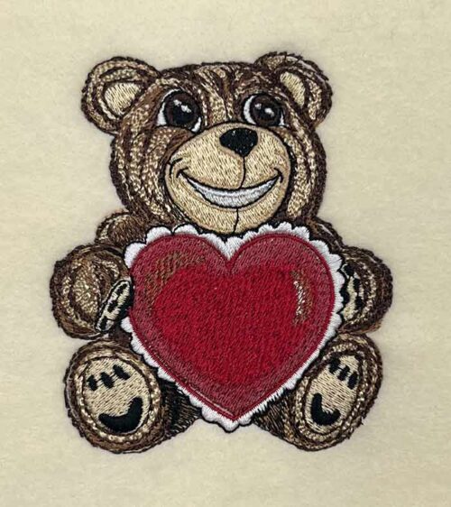 Teddy Holding heart embroidery design