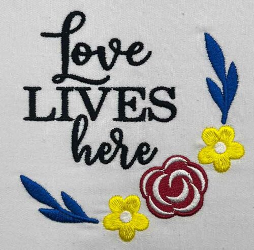 Love lives here embroidery design